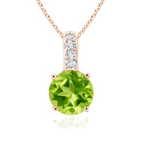 AAA - Peridot / 0.57 CT / 14 KT Rose Gold