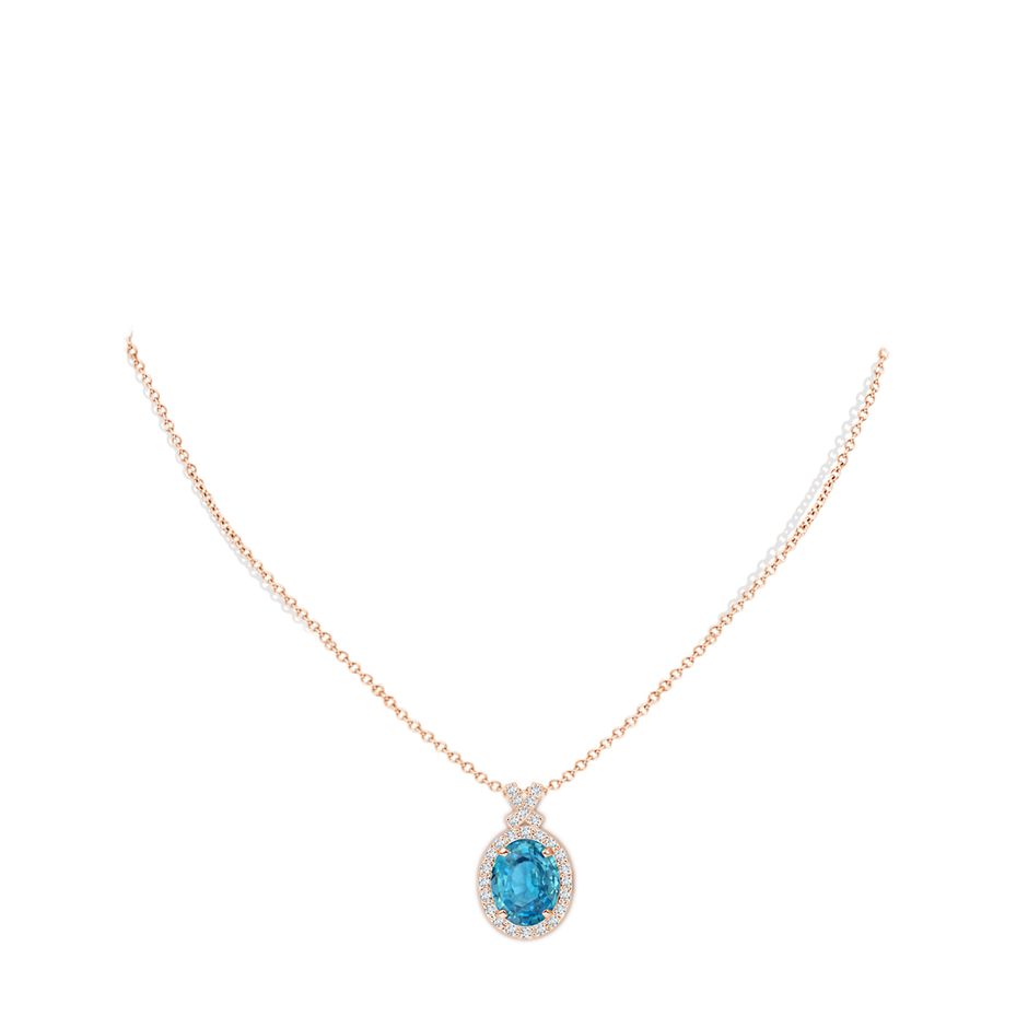 10.13x8.07x4.79mm AAA Vintage Style GIA Certified Blue Zircon Pendant with Diamond Halo in Rose Gold pen