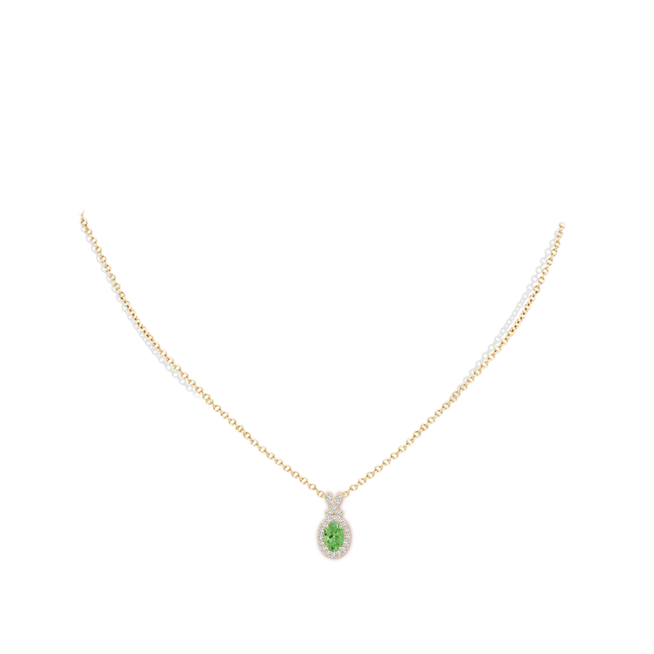 6x4mm A Vintage Style Tsavorite Pendant with Diamond Halo in Yellow Gold pen
