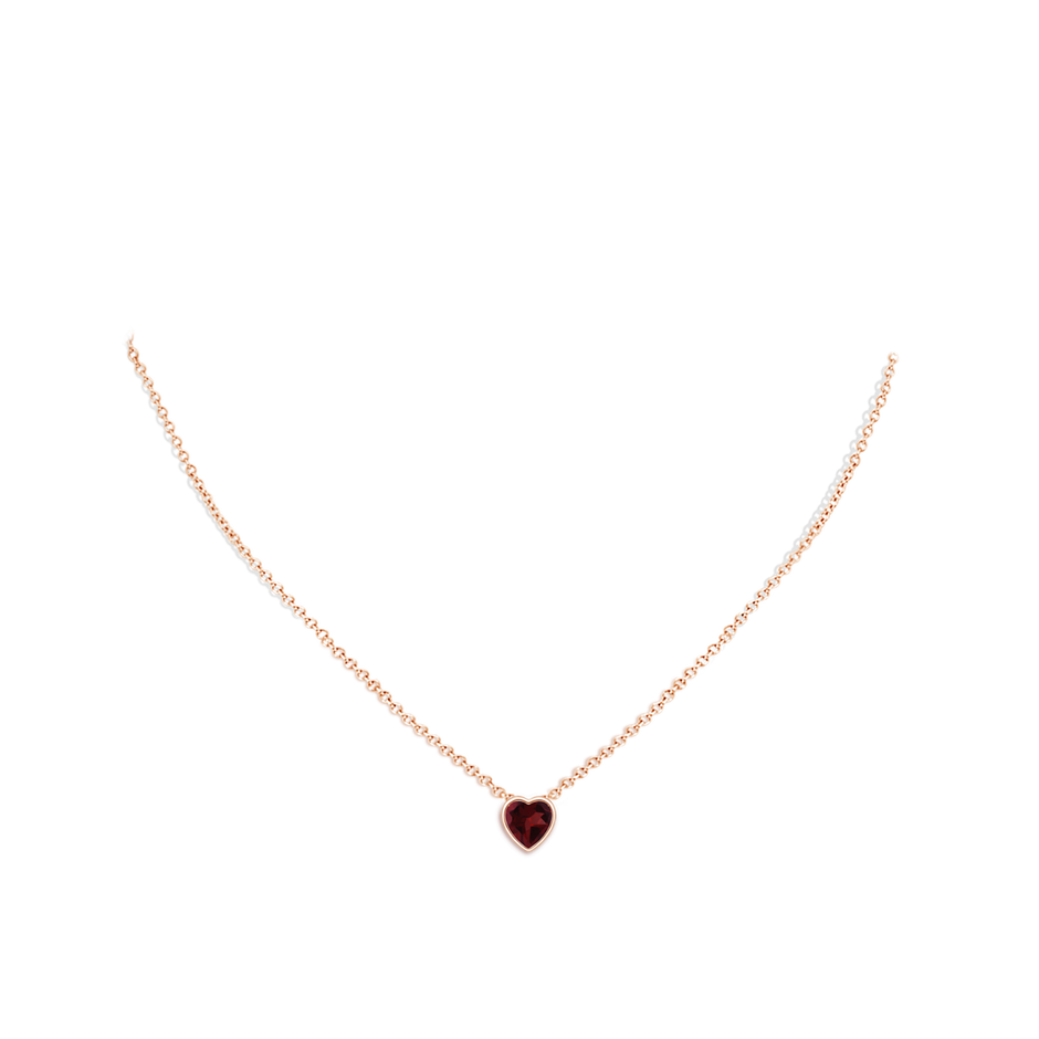 6mm A Bezel-Set Solitaire Heart Garnet Pendant in Rose Gold pen