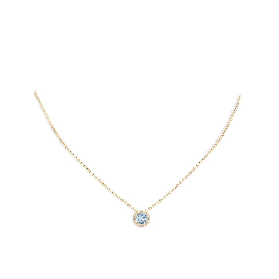 7mm A Bezel-Set Round Aquamarine Solitaire Pendant in Yellow Gold pen