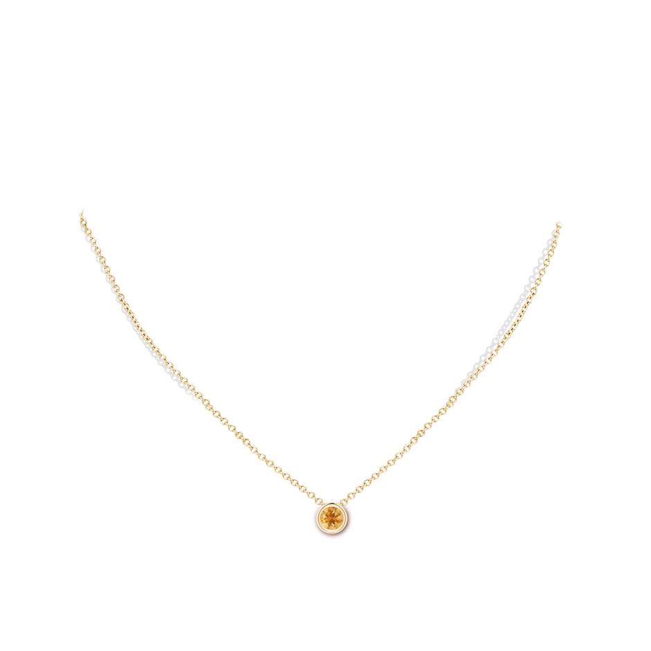 5mm A Bezel-Set Round Citrine Solitaire Pendant in Yellow Gold pen