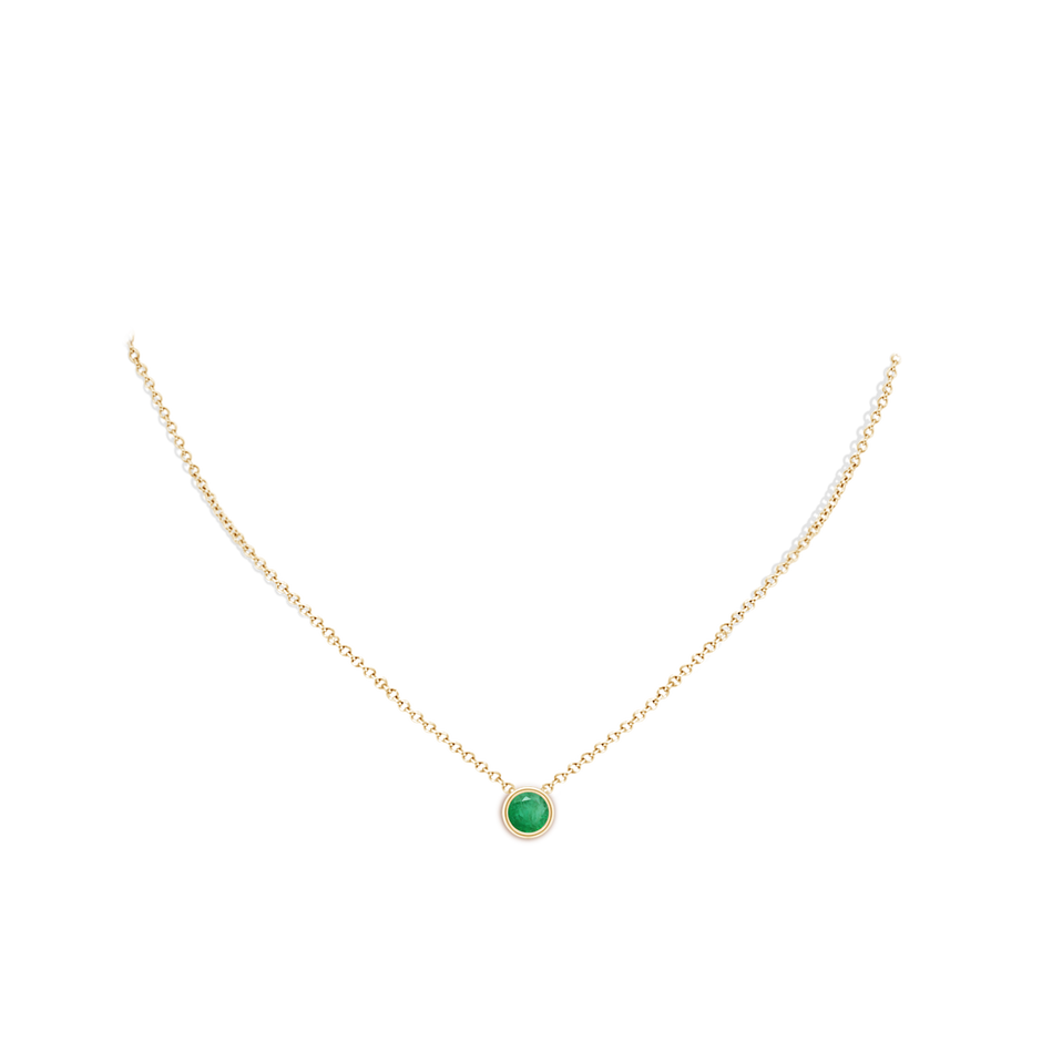 6mm A Bezel-Set Round Emerald Solitaire Pendant in Yellow Gold pen