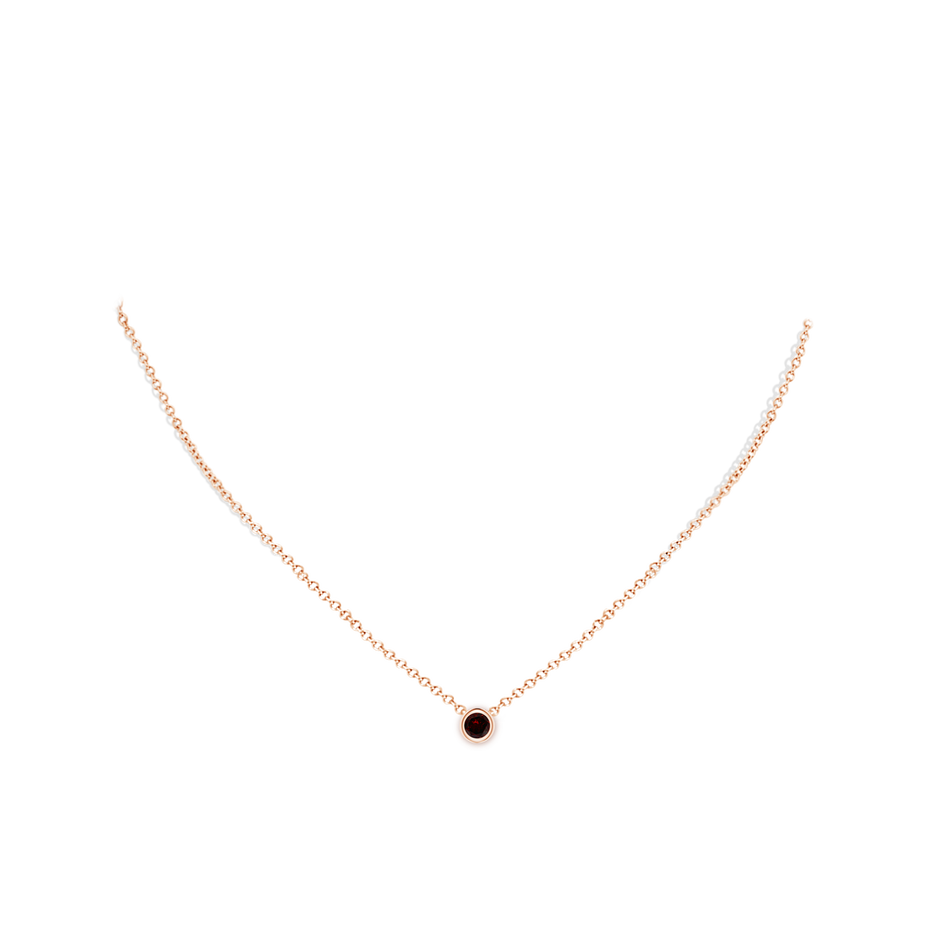 4mm A Bezel-Set Round Garnet Solitaire Pendant in Rose Gold pen