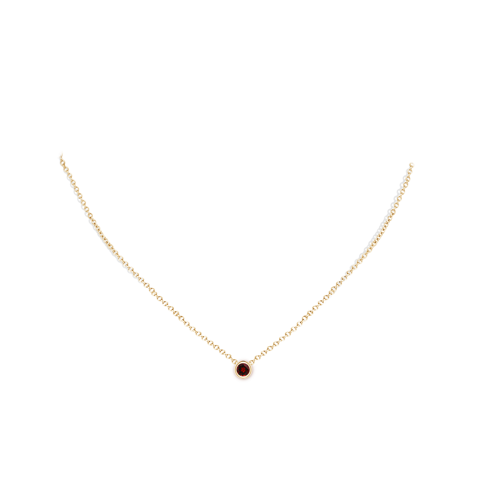 4mm AAAA Bezel-Set Round Garnet Solitaire Pendant in Yellow Gold pen