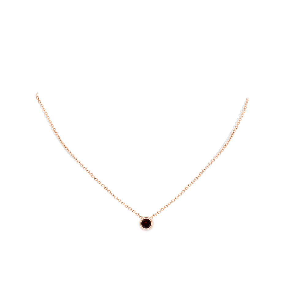 5mm A Bezel-Set Round Garnet Solitaire Pendant in Rose Gold pen