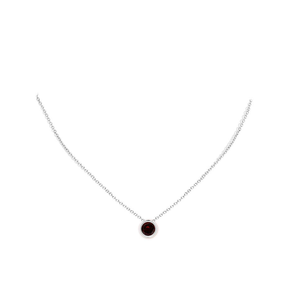7mm A Bezel-Set Round Garnet Solitaire Pendant in White Gold pen