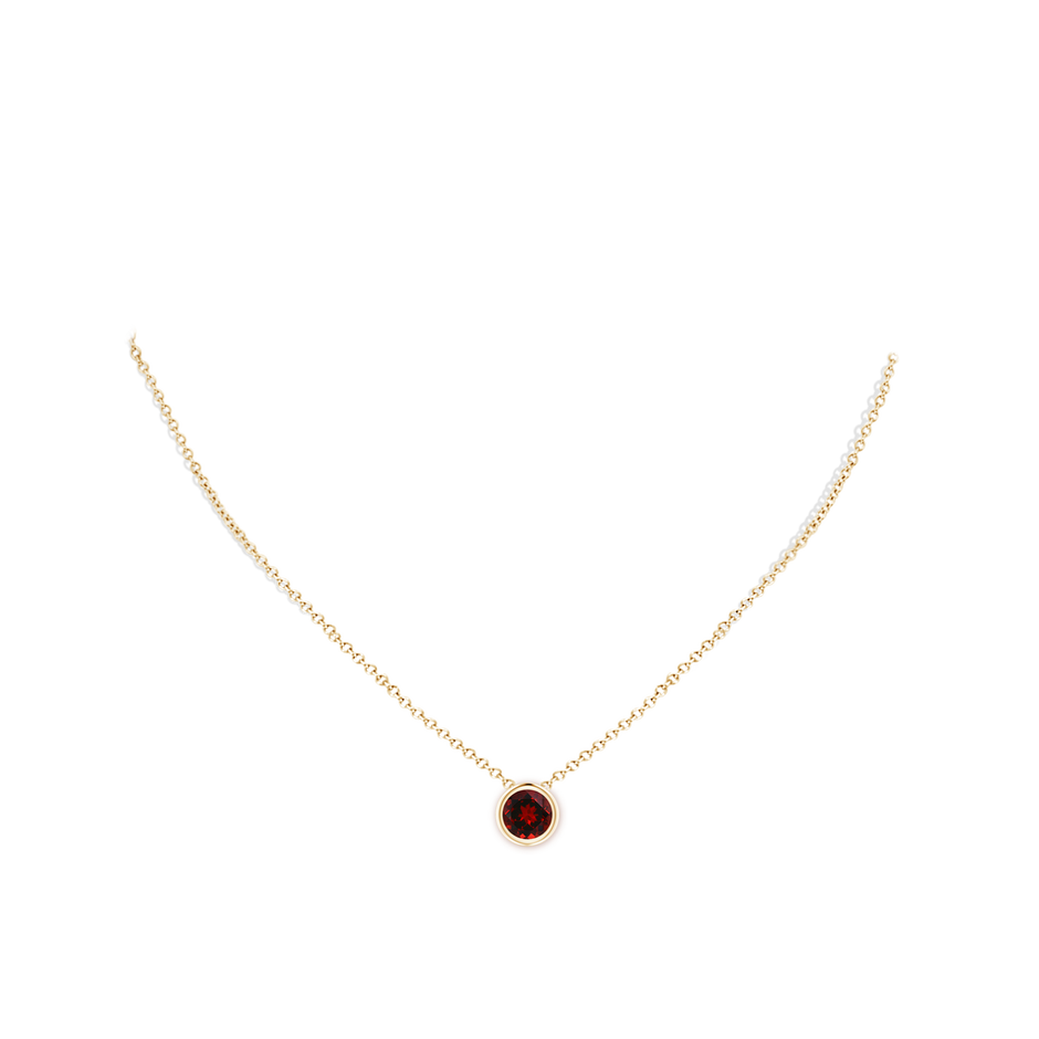 7mm AAAA Bezel-Set Round Garnet Solitaire Pendant in Yellow Gold pen