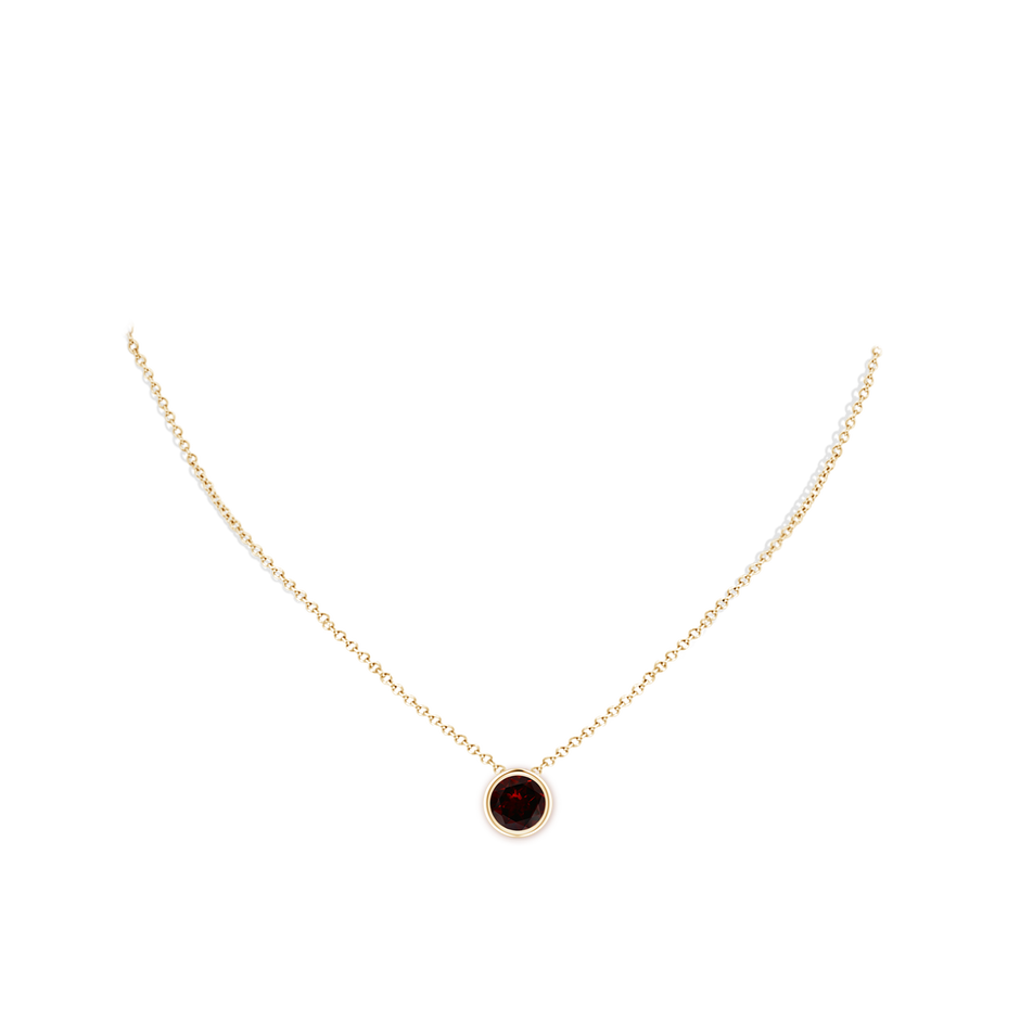8mm A Bezel-Set Round Garnet Solitaire Pendant in Yellow Gold pen