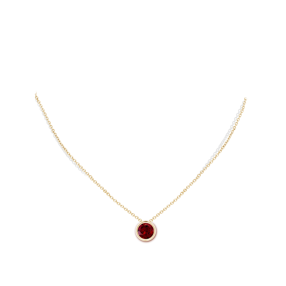 8mm AAA Bezel-Set Round Garnet Solitaire Pendant in Yellow Gold pen