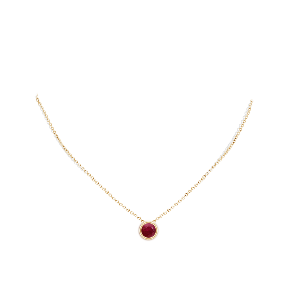 8mm A Bezel-Set Round Ruby Solitaire Pendant in Yellow Gold pen