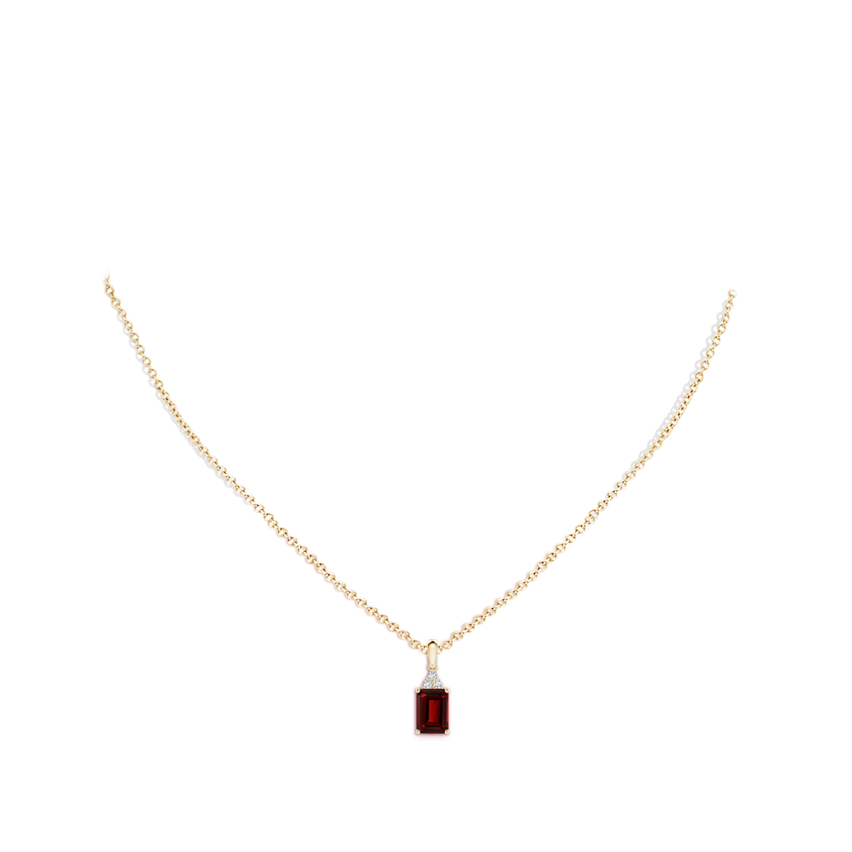 7x5mm AAAA Emerald-Cut Garnet Pendant with Diamond Trio in Yellow Gold pen