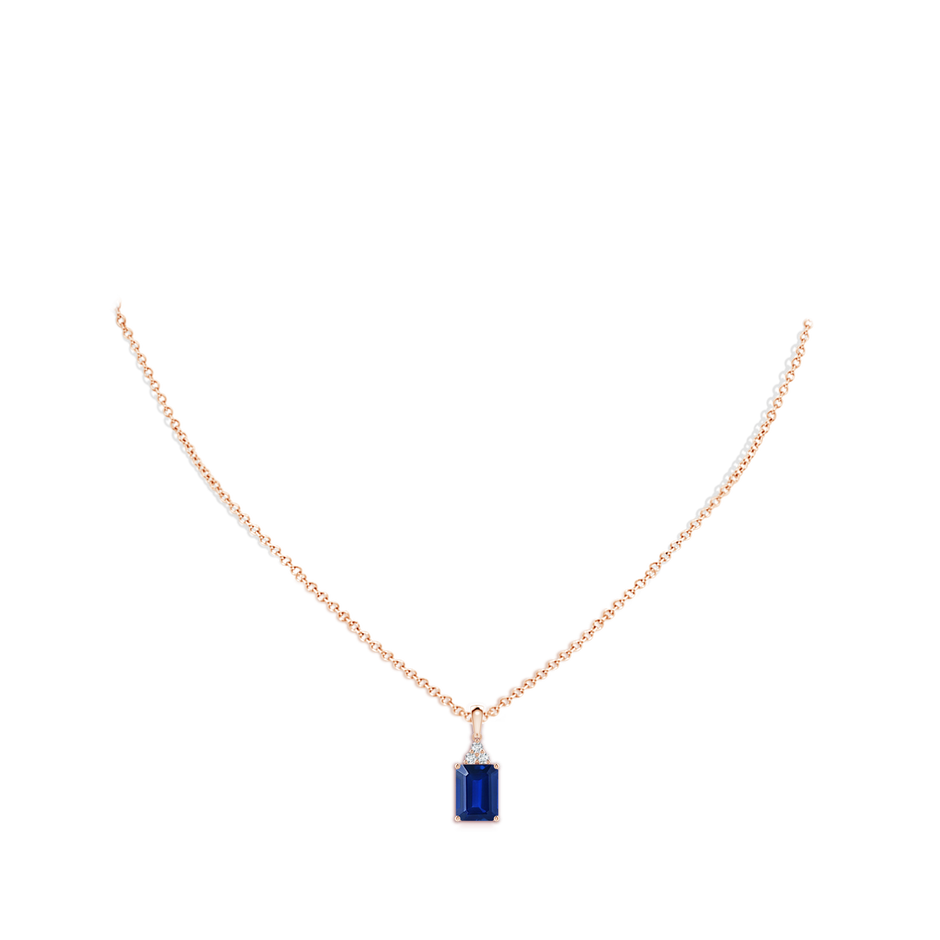 8x6mm AAAA Emerald-Cut Blue Sapphire Pendant with Diamond Trio in Rose Gold pen