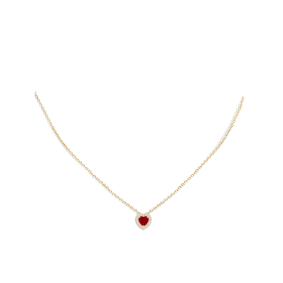 5mm AAA Heart-Shaped Ruby Pendant with Diamond Halo in Yellow Gold pen