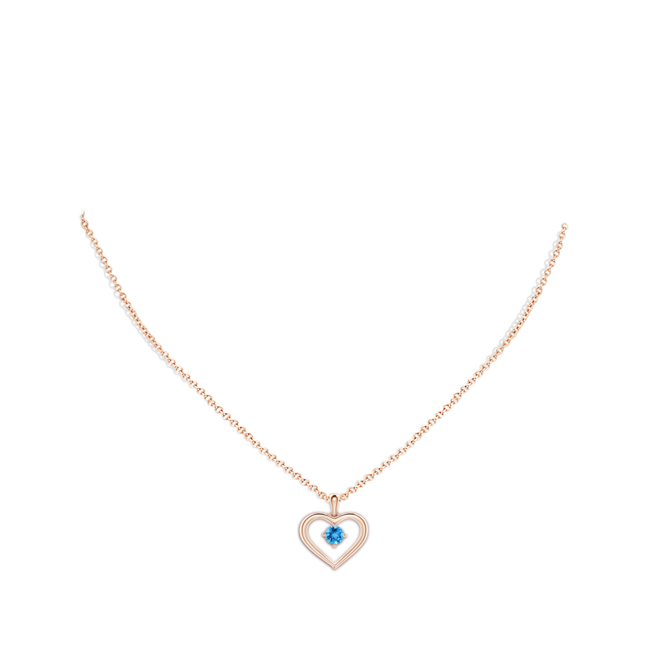 4mm AAA Solitaire Round Swiss Blue Topaz Open Heart Pendant in Rose Gold body-neck