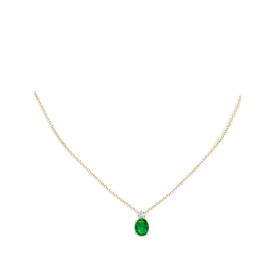 10x8mm AAAA Oval Emerald Solitaire Pendant with Diamond in Yellow Gold pen