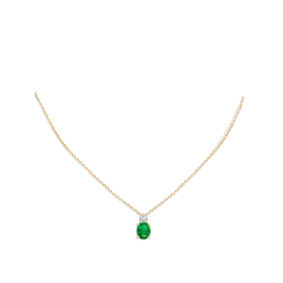 9x7mm AAA Oval Emerald Solitaire Pendant with Diamond in Yellow Gold pen
