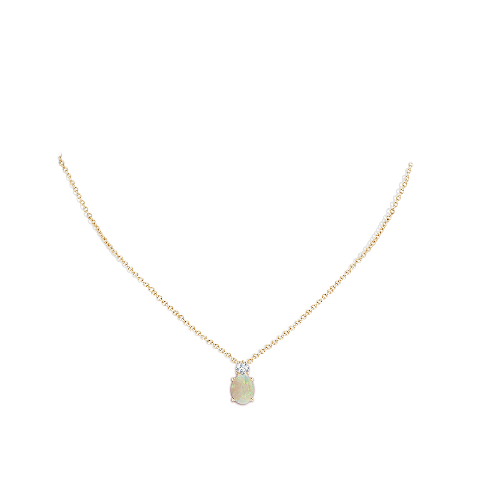 9x7mm AAA Oval Opal Solitaire Pendant with Diamond in Yellow Gold body-neck