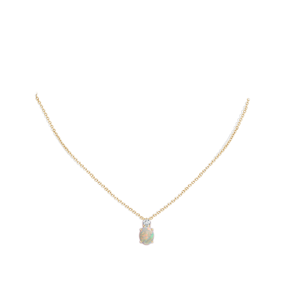 9x7mm AAAA Oval Opal Solitaire Pendant with Diamond in Yellow Gold body-neck