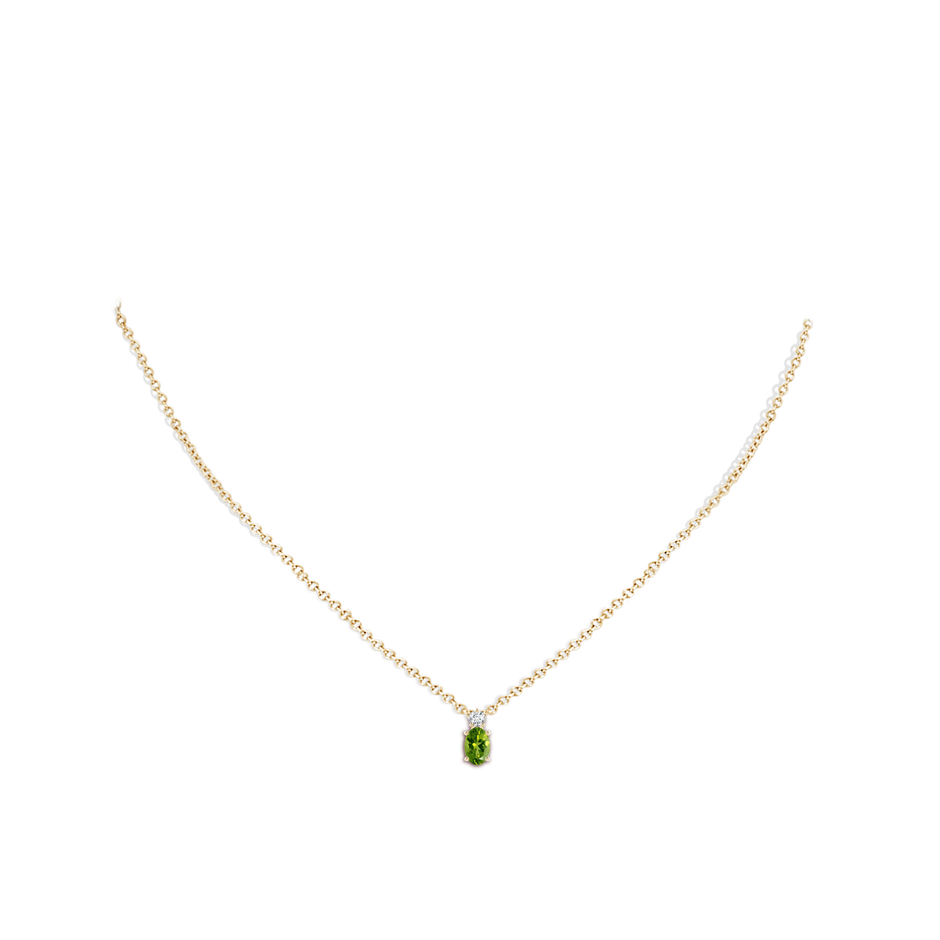 6x4mm AAAA Oval Peridot Solitaire Pendant with Diamond in Yellow Gold pen