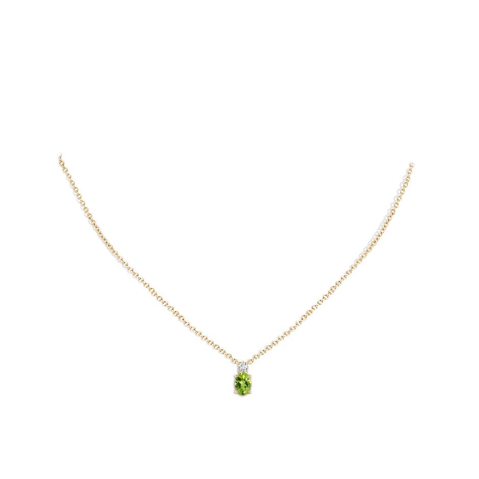 7x5mm AAA Oval Peridot Solitaire Pendant with Diamond in Yellow Gold pen