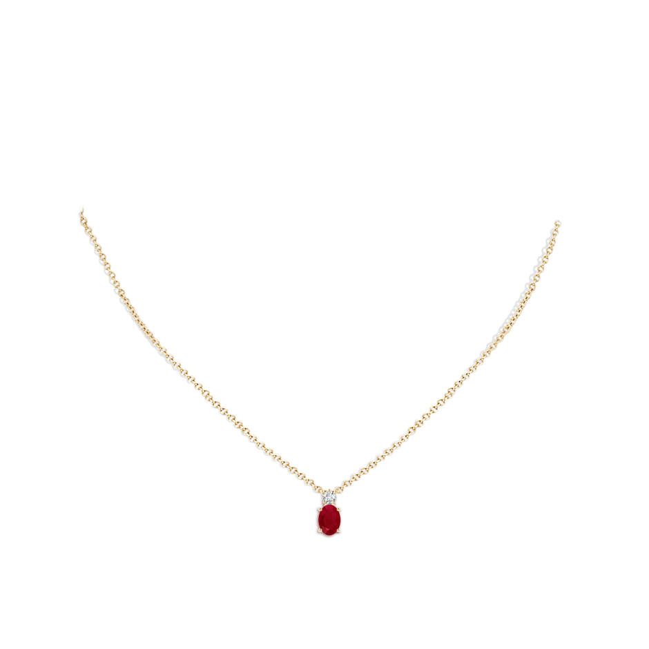 7x5mm AA Oval Ruby Solitaire Pendant with Diamond in Yellow Gold pen