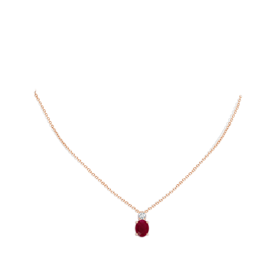 9x7mm A Oval Ruby Solitaire Pendant with Diamond in Rose Gold pen