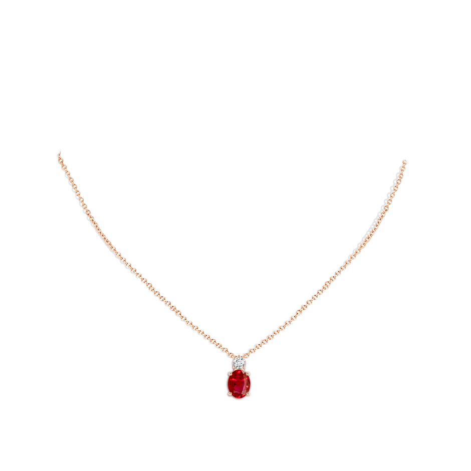 9x7mm AAA Oval Ruby Solitaire Pendant with Diamond in Rose Gold pen