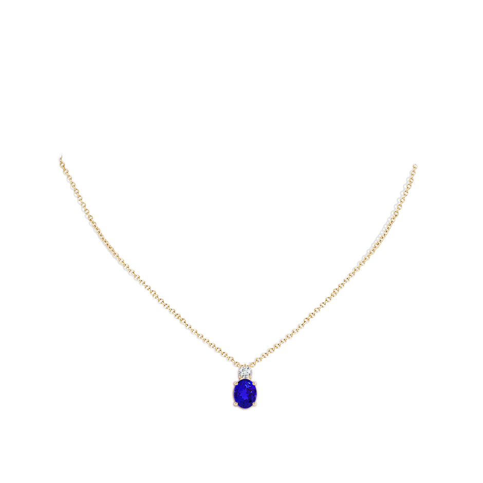 9x7mm AAAA Oval Tanzanite Solitaire Pendant with Diamond in Yellow Gold body-neck