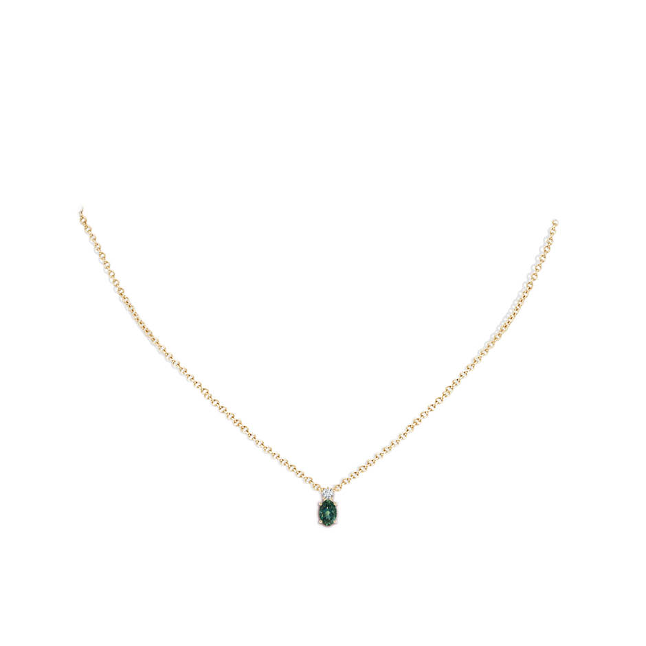 6x4mm AA Oval Teal Montana Sapphire Solitaire Pendant with Diamond in Yellow Gold body-neck