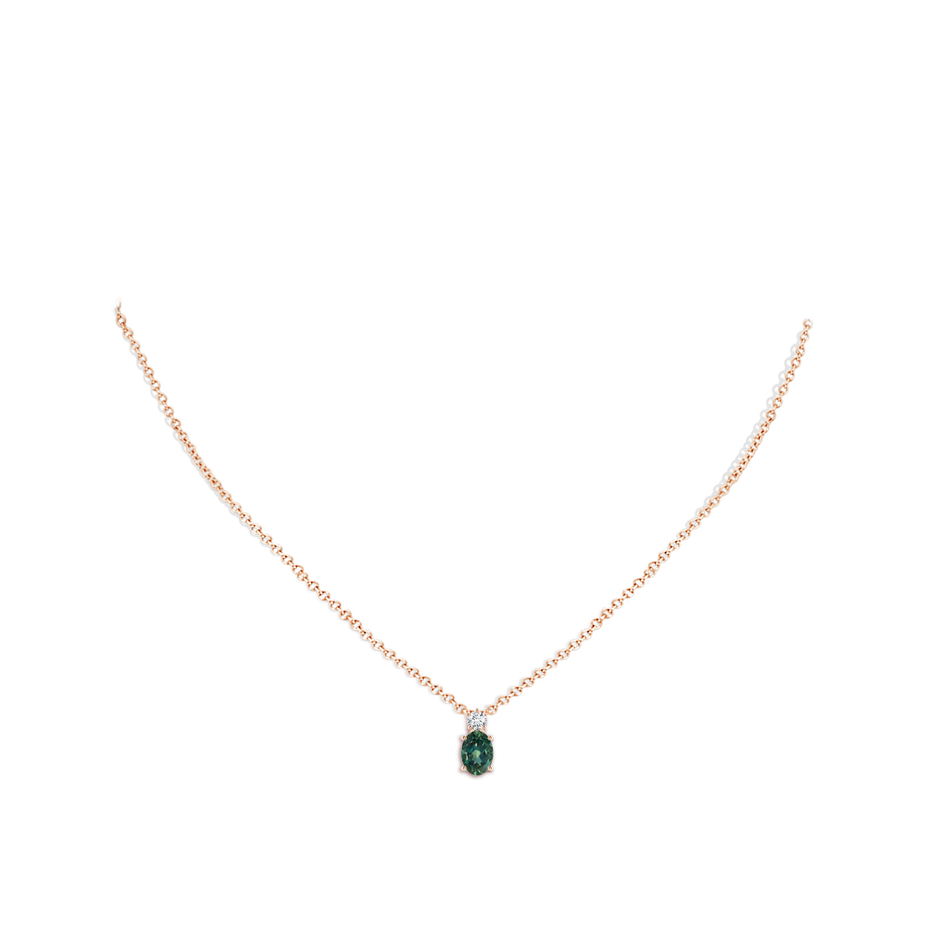 7x5mm AA Oval Teal Montana Sapphire Solitaire Pendant with Diamond in Rose Gold body-neck