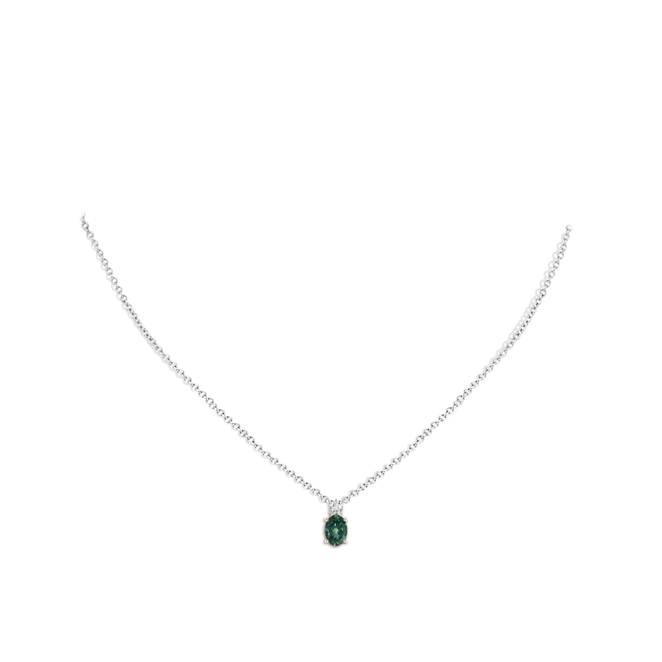 7x5mm AA Oval Teal Montana Sapphire Solitaire Pendant with Diamond in White Gold body-neck