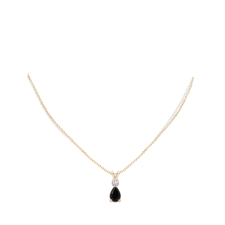 9x7mm AAA Prong-Set Black Onyx Teardrop V-Bale Pendant with Diamond in Yellow Gold pen