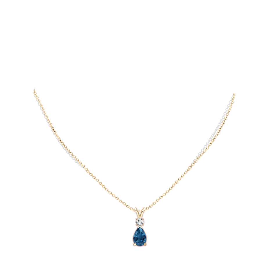 10x7mm AA London Blue Topaz Teardrop Pendant with Diamond in Yellow Gold pen