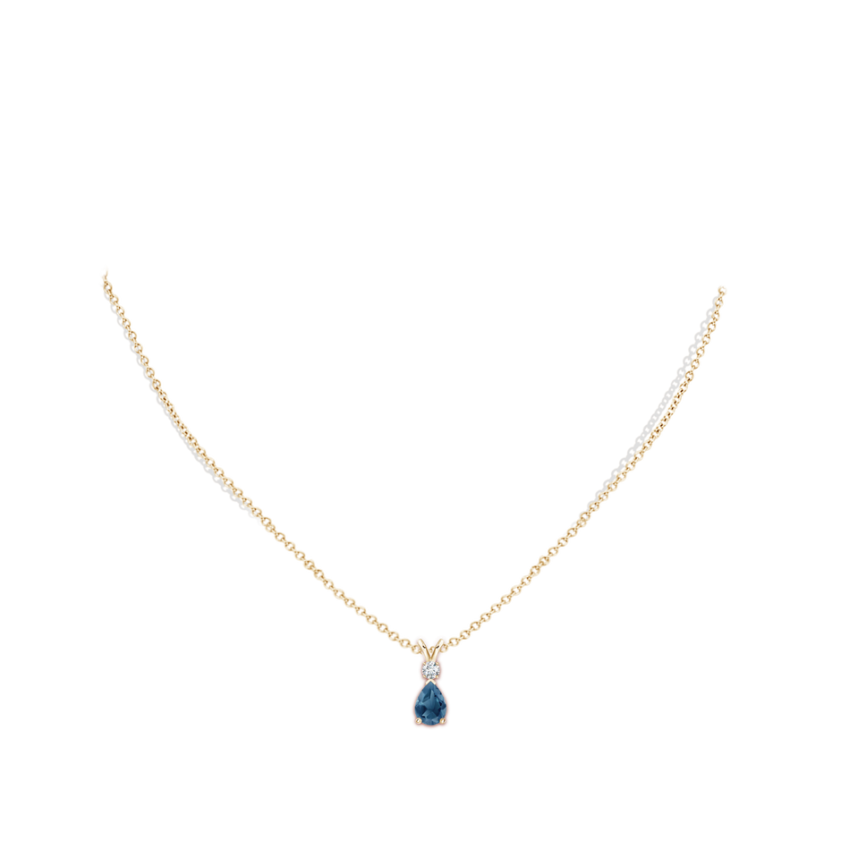 7x5mm A London Blue Topaz Teardrop Pendant with Diamond in Yellow Gold pen