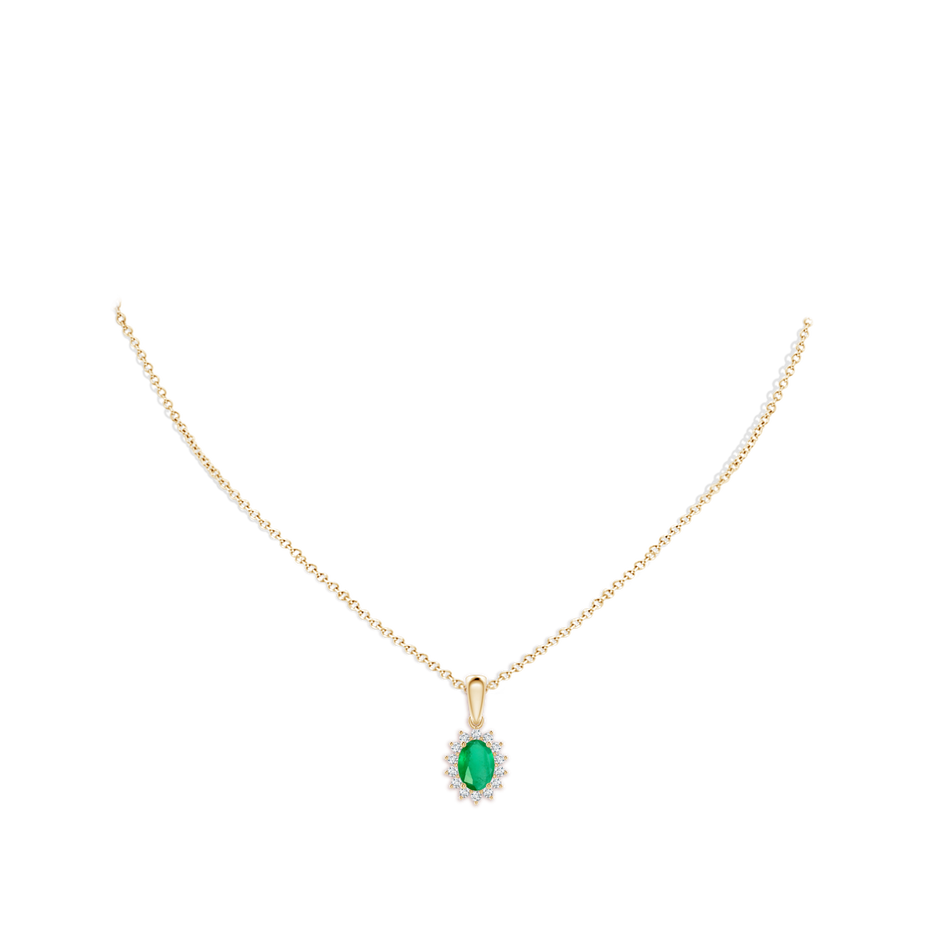 7x5mm A Oval Emerald Pendant with Floral Diamond Halo in Yellow Gold pen