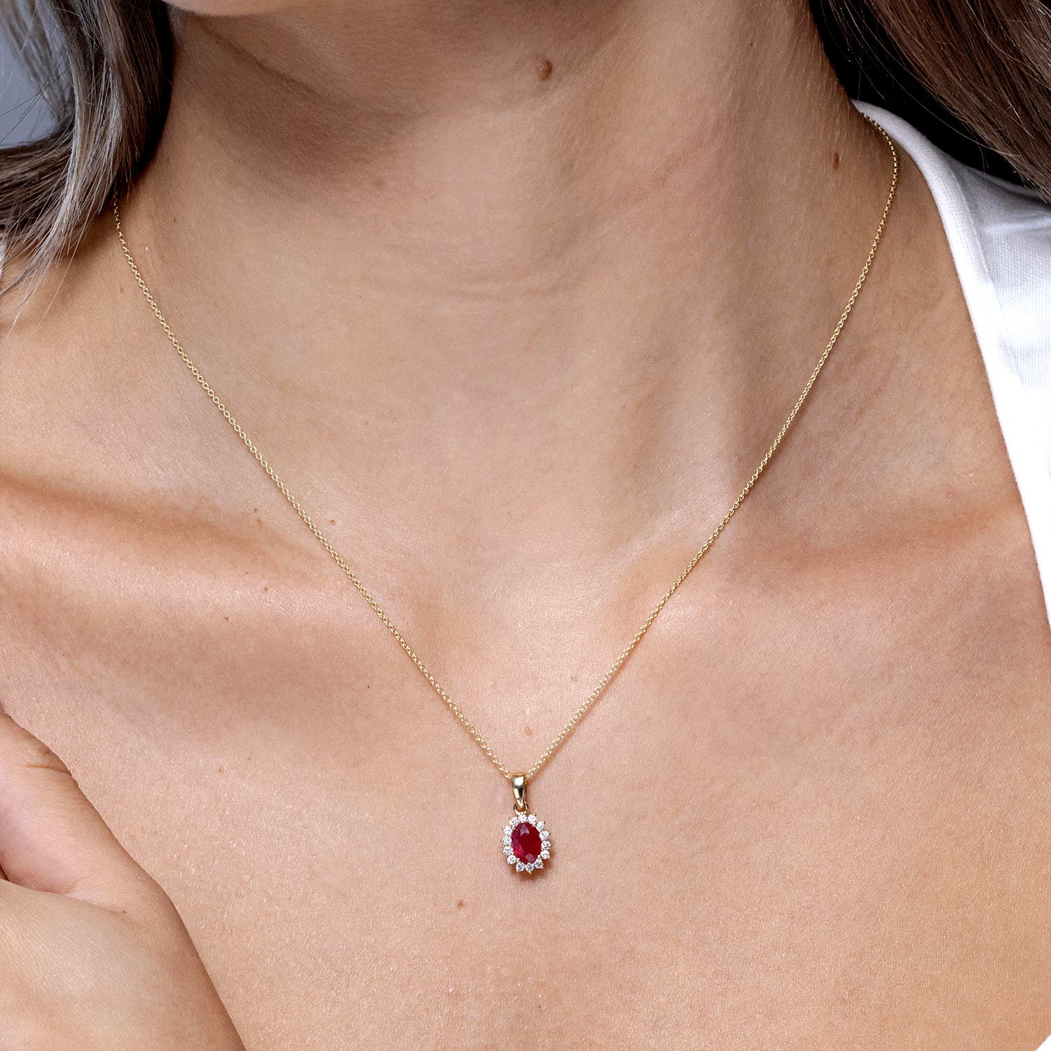 Oval Ruby Pendant with Floral Diamond Halo
