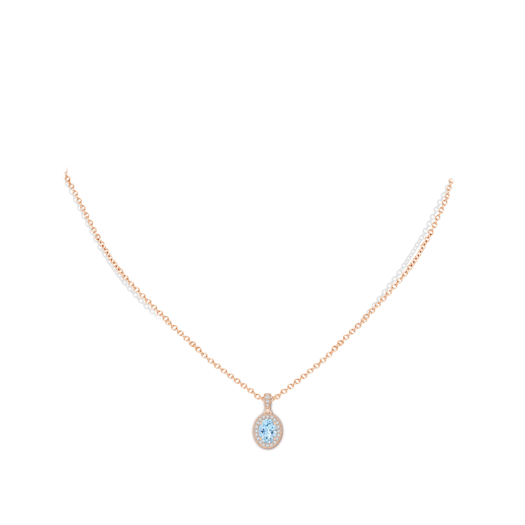 7x5mm AAA Vintage Style Oval Aquamarine Pendant with Diamond Halo in 10K Rose Gold pen