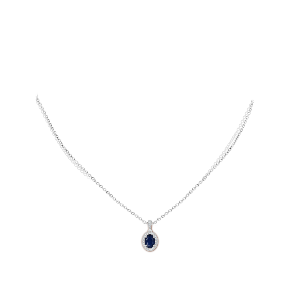 7x5mm A Vintage Style Oval Sapphire Pendant with Diamond Halo in White Gold pen
