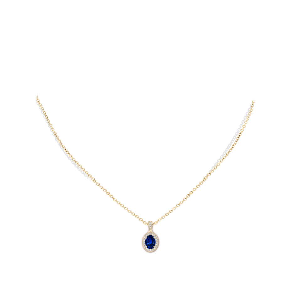 7x5mm AAAA Vintage Style Oval Sapphire Pendant with Diamond Halo in Yellow Gold pen