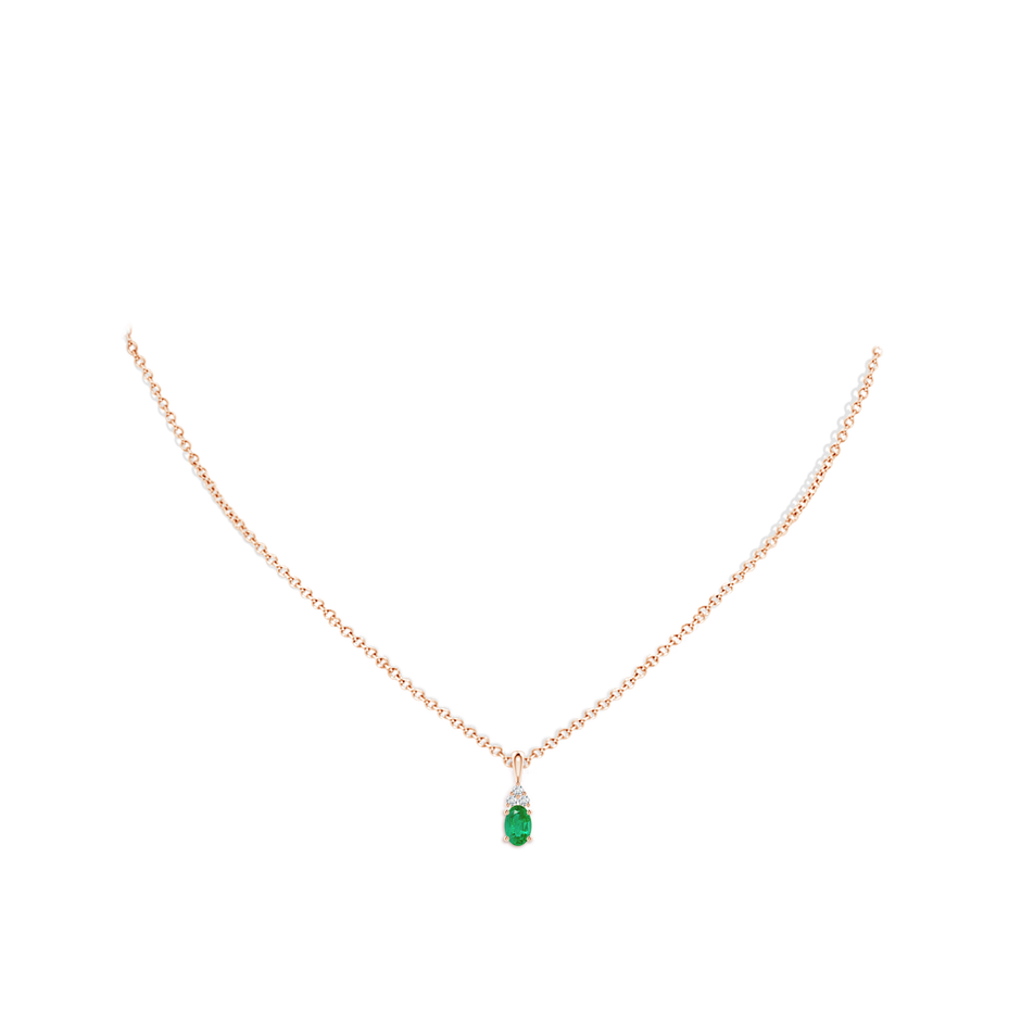 6x4mm AA Oval Emerald Solitaire Pendant with Trio Diamond in Rose Gold pen