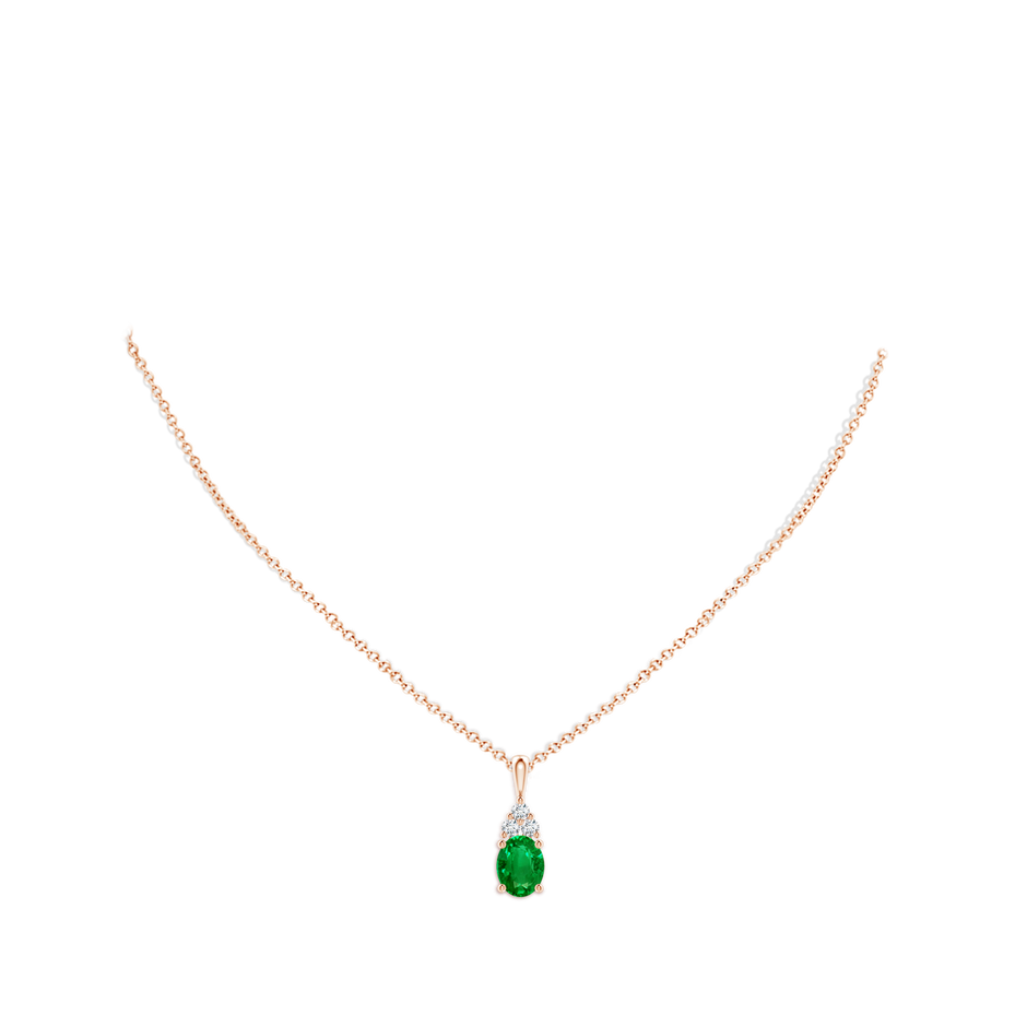 9x7mm AAAA Oval Emerald Solitaire Pendant with Trio Diamond in Rose Gold pen