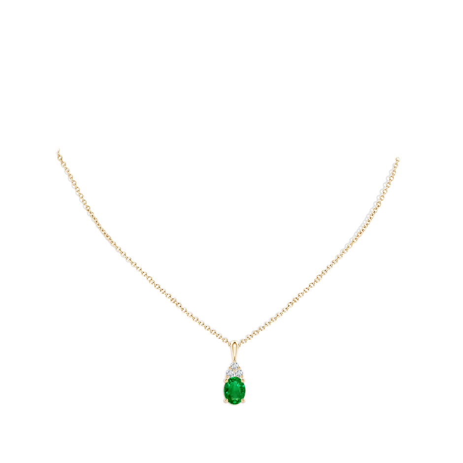 9x7mm AAAA Oval Emerald Solitaire Pendant with Trio Diamond in Yellow Gold pen