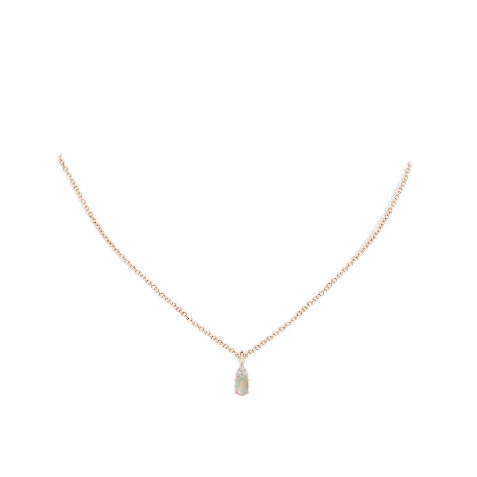 6x4mm AAAA Oval Opal Solitaire Pendant with Trio Diamond in 9K Rose Gold body-neck