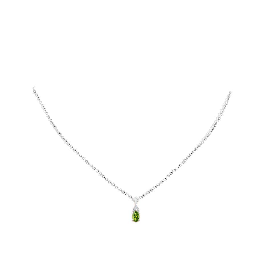 6x4mm AAAA Oval Peridot Solitaire Pendant with Trio Diamond in White Gold body-neck