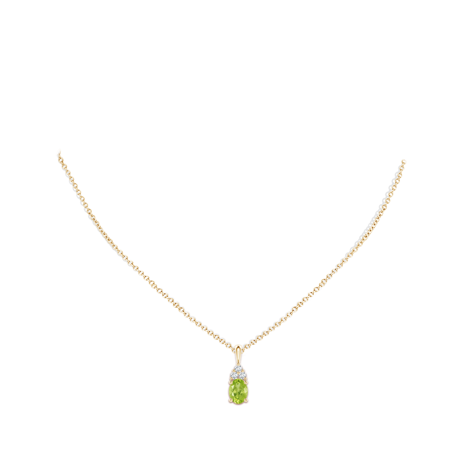 8x6mm AA Oval Peridot Solitaire Pendant with Trio Diamond in Yellow Gold body-neck