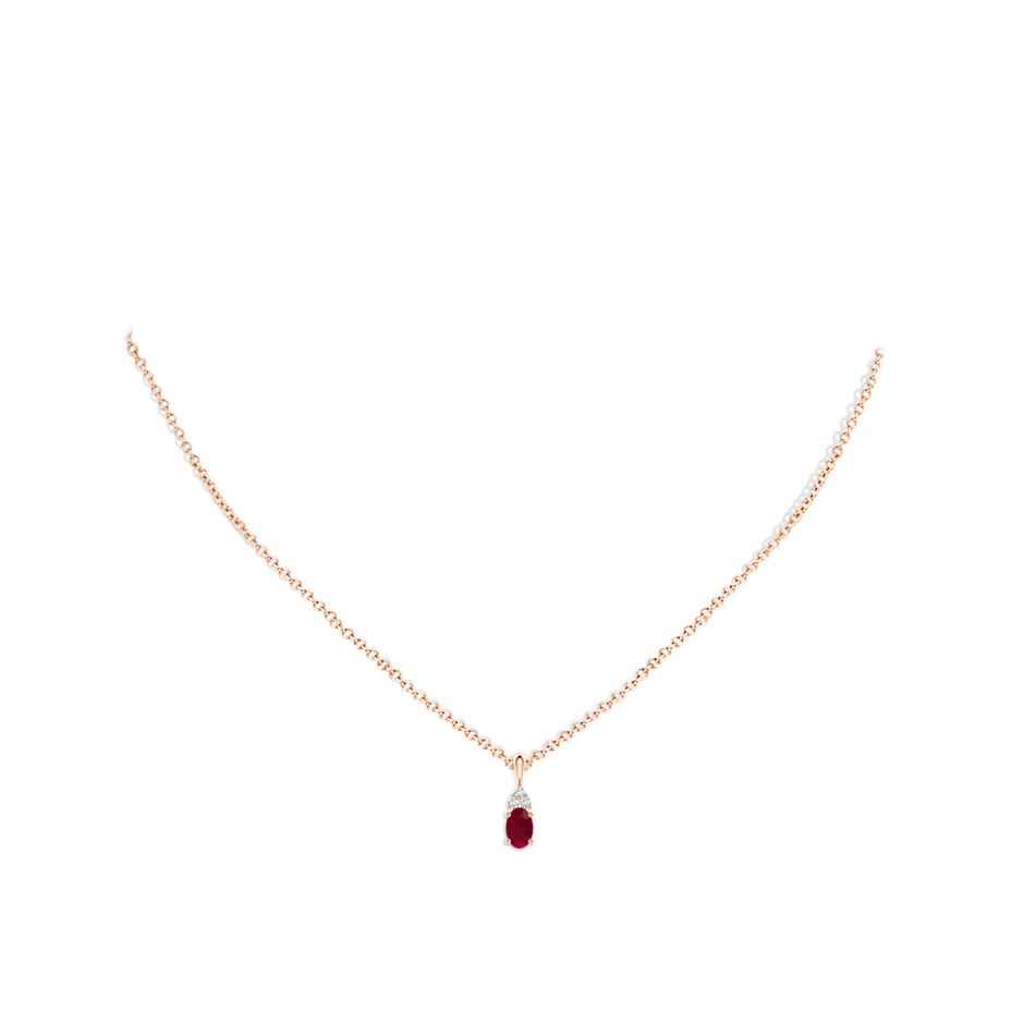 6x4mm A Oval Ruby Solitaire Pendant with Trio Diamond in Rose Gold pen