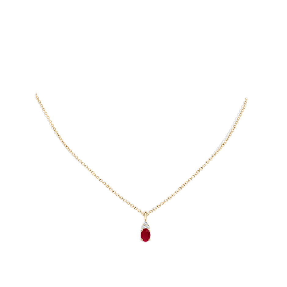 7x5mm AA Oval Ruby Solitaire Pendant with Trio Diamond in Yellow Gold pen