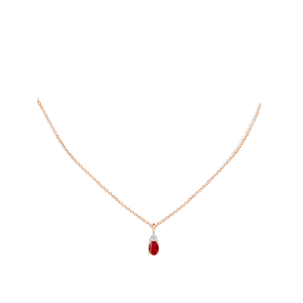7x5mm AAA Oval Ruby Solitaire Pendant with Trio Diamond in Rose Gold pen