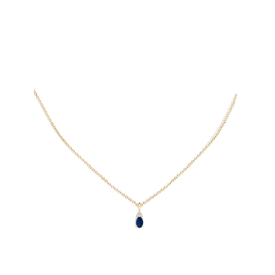 6x4mm AA Oval Sapphire Solitaire Pendant with Trio Diamond in Yellow Gold pen